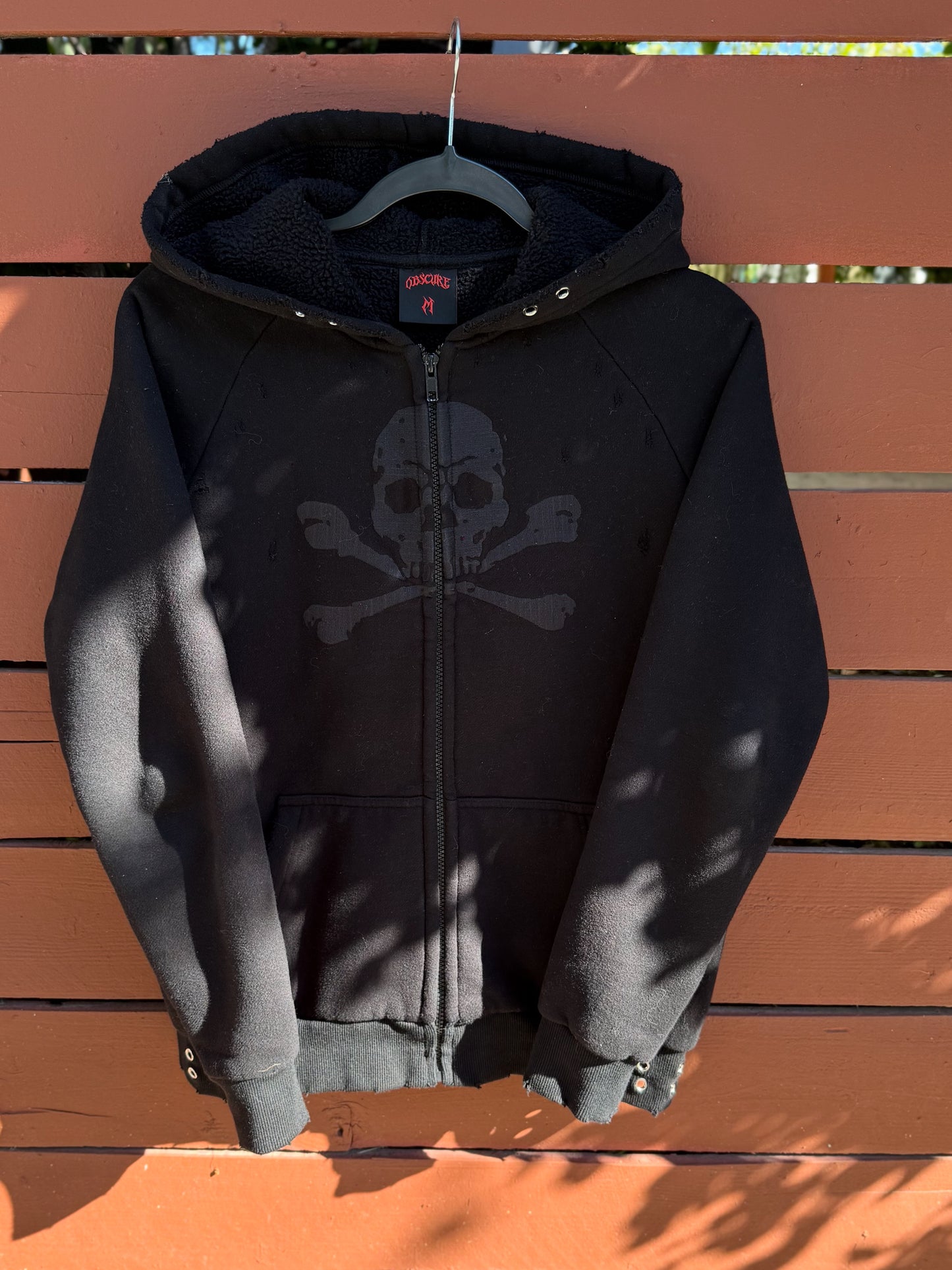 "skully" zip up